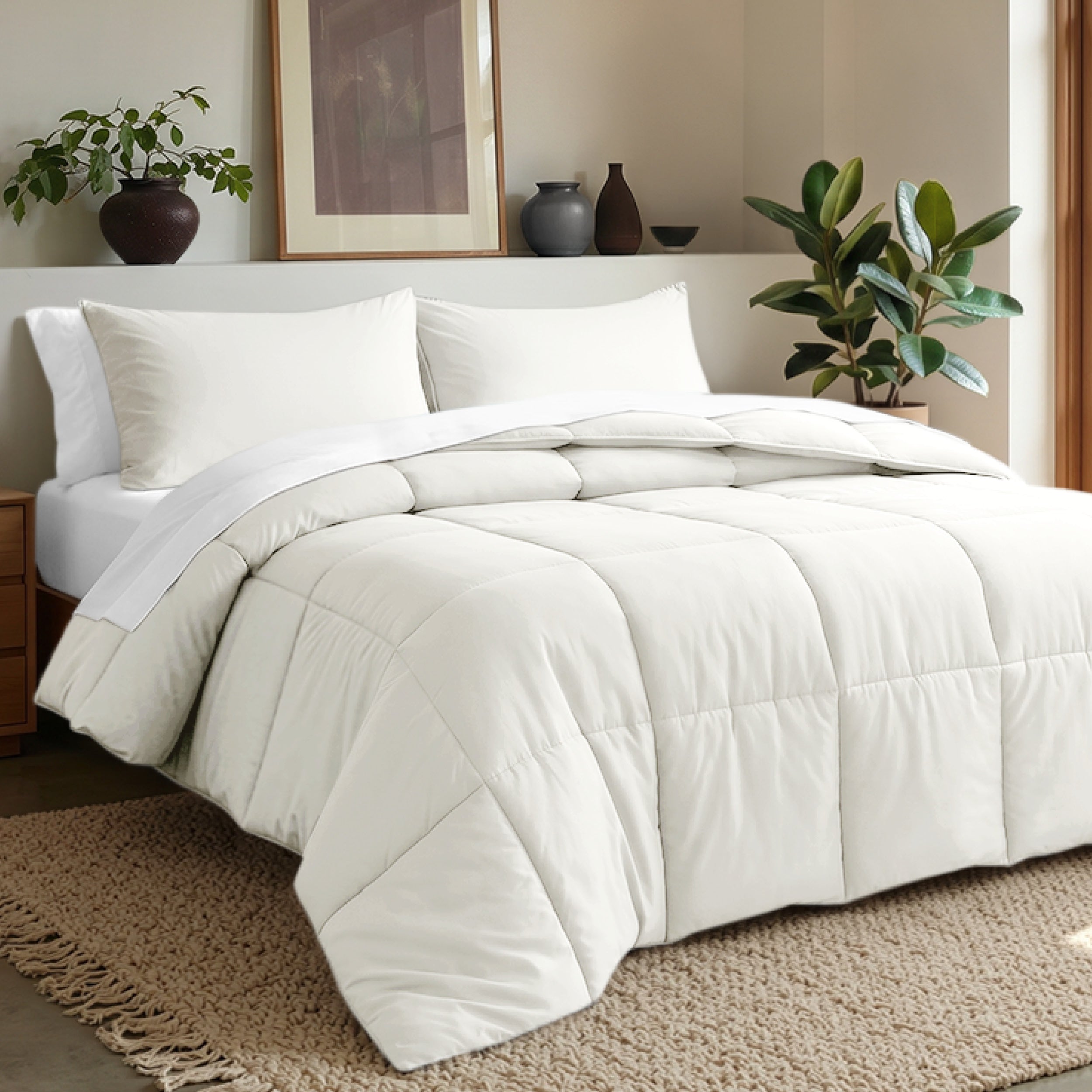 Comforter set on a bed in a bedroom with plants and decor.