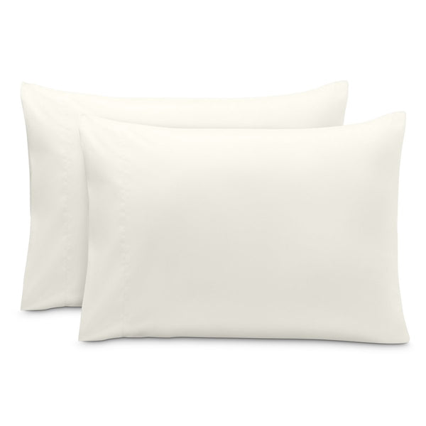 2 pillowcases on pillows