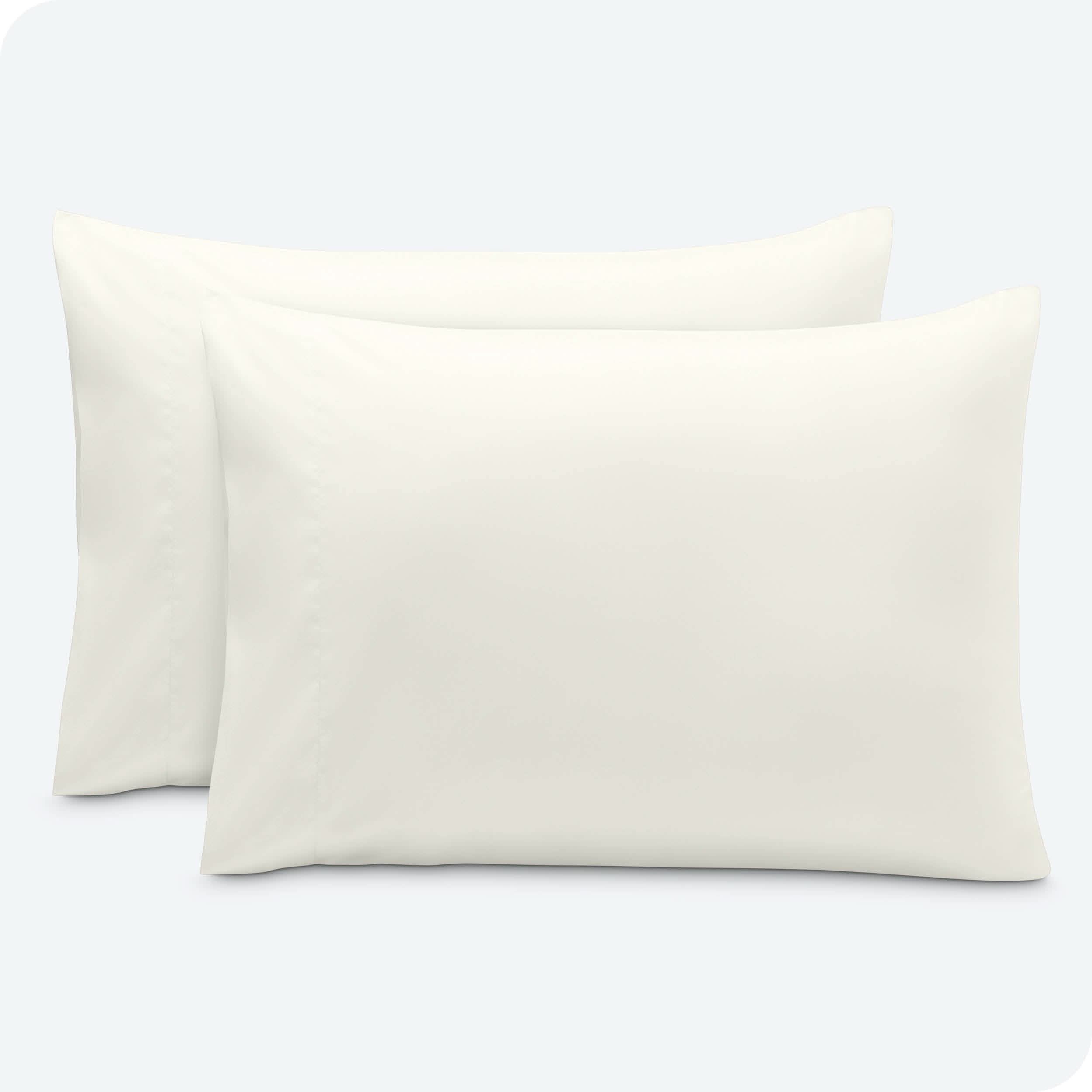 2 pillowcases on pillows