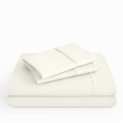 Microfiber sheet set folded and stacked neatly.