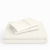 Microfiber sheet set folded and stacked neatly.