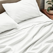 Close up of ultra-soft sheets on a bed