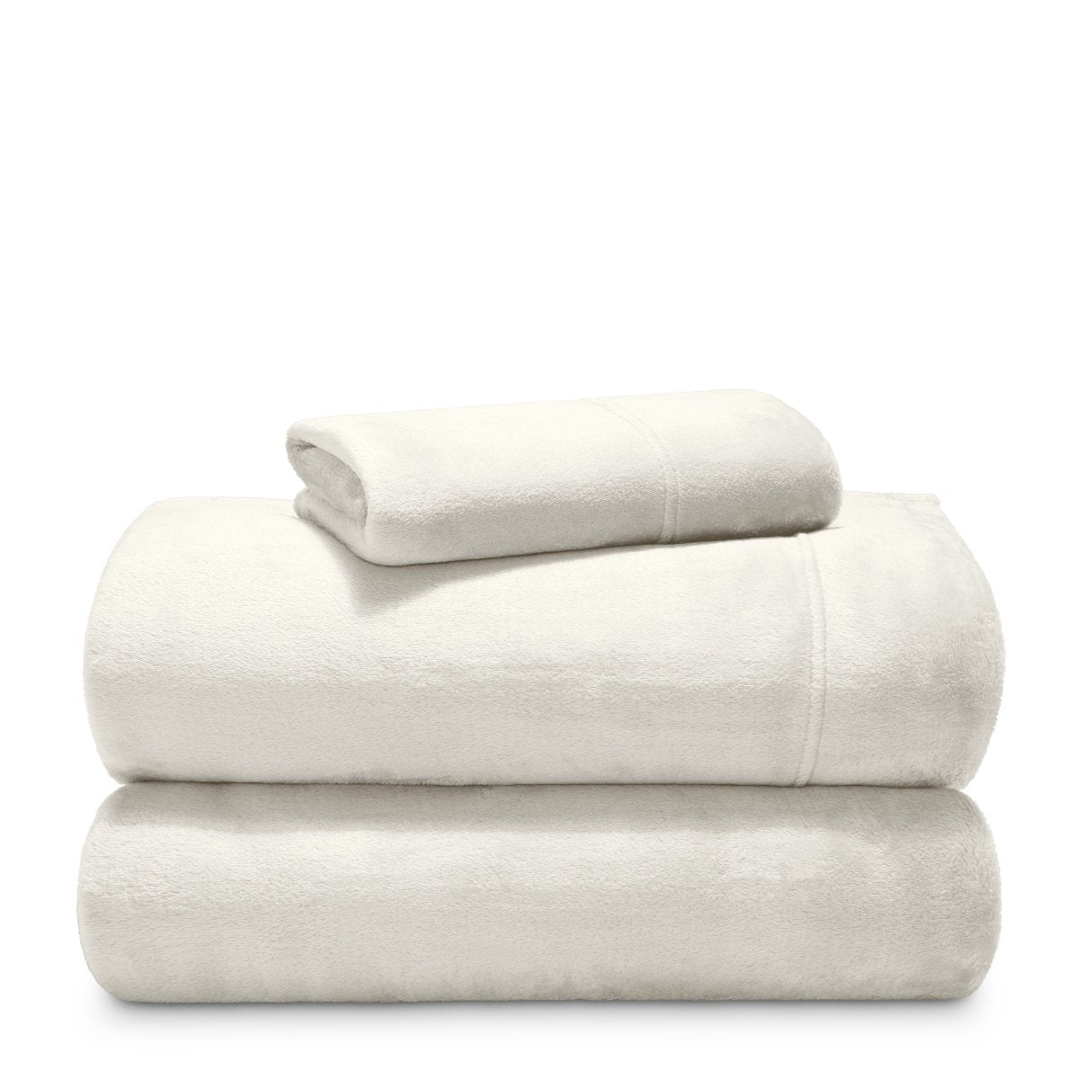 Stack of microplush sheets on a white background