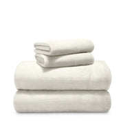 Stack of microplush sheets on a white background