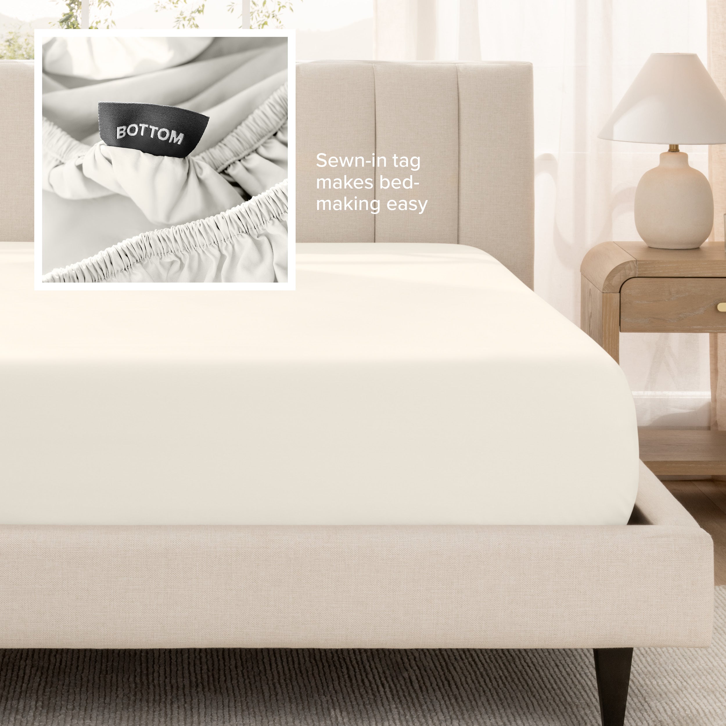 Bed with a fitted sheet next to a nightstand in a bedroom setting