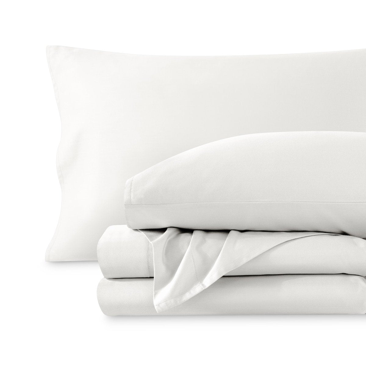 A sateen sheet set folded and stacked on a white background.