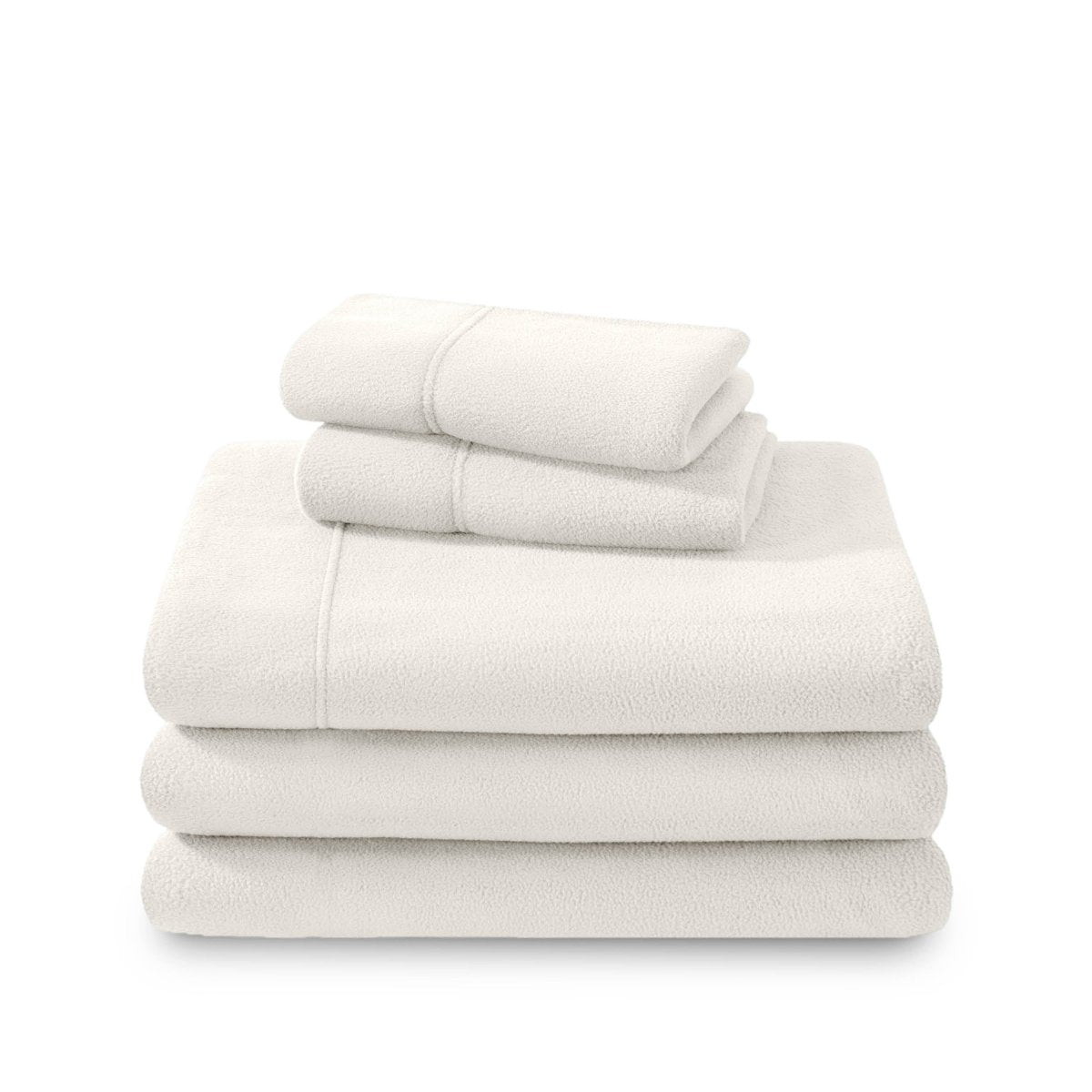 Polar fleece sheets and pillowcases folded and stacked on a white background