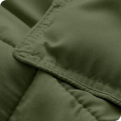 A close up of a corner of the microfiber comforter