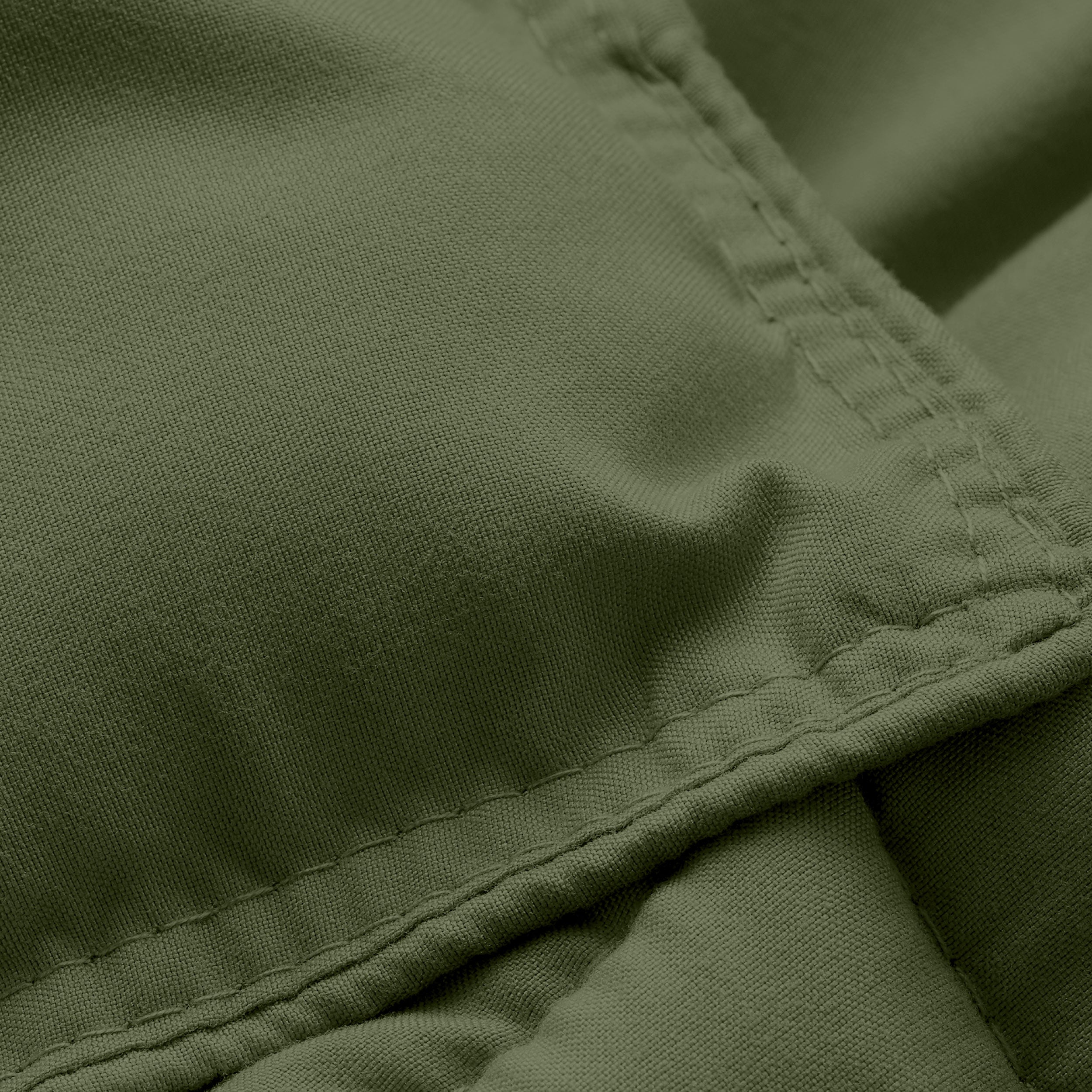Close-up of comforter fabric with stitching detail
