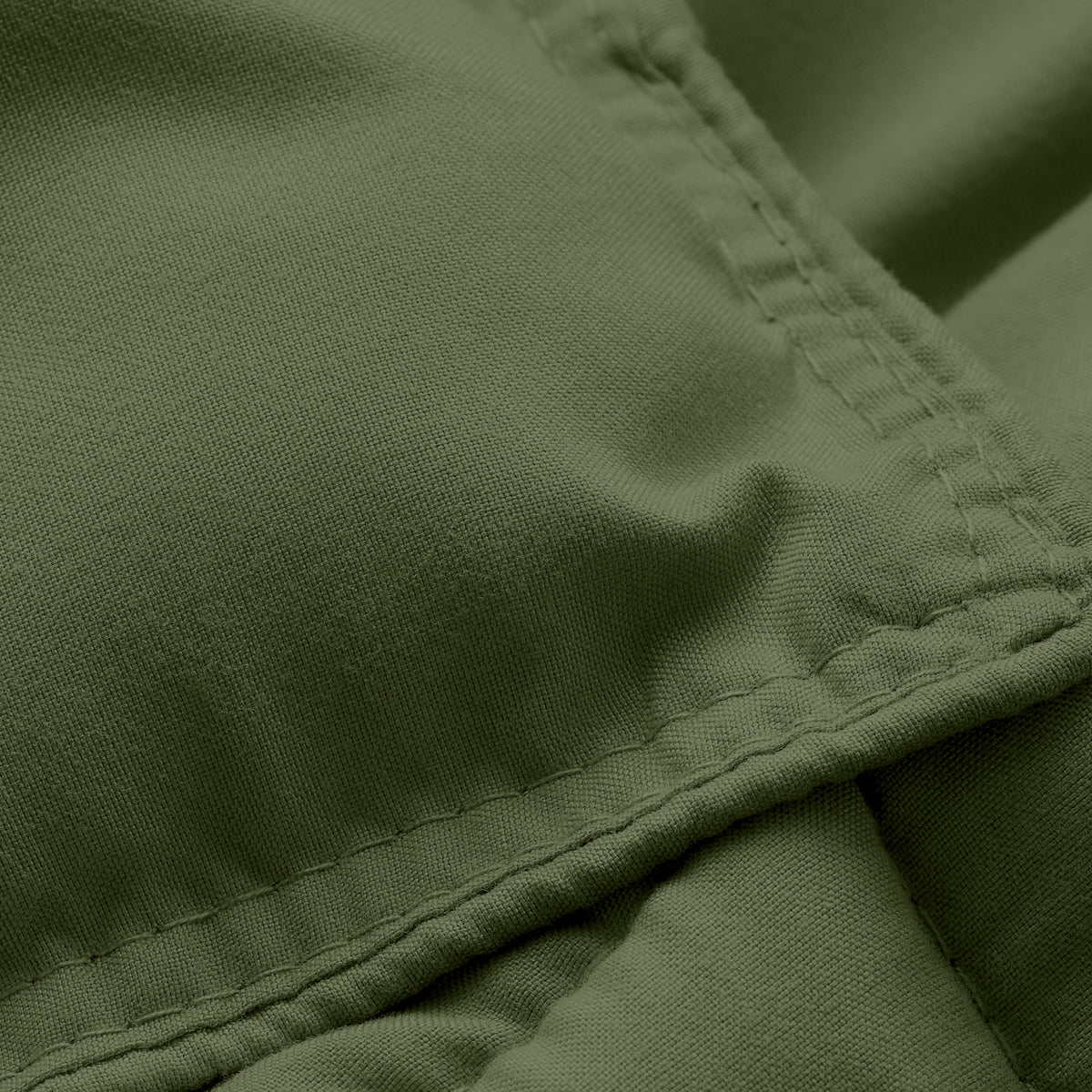Close-up of comforter fabric with stitching detail