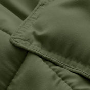 Close-up of comforter fabric with stitching detail