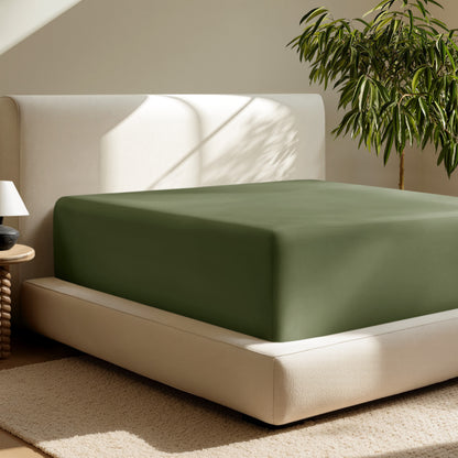 A deep pocket fitted sheet on a mattress