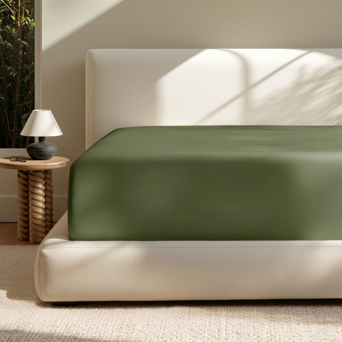 A deep pocket mattress with a fitted sheet on it