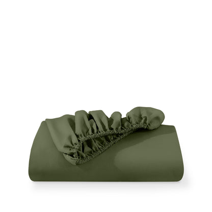 A deep pocket fitted sheet folded on a white background