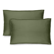 Two microfiber pillow shams on a white background