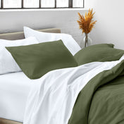 Close up of pillow shams on a bed