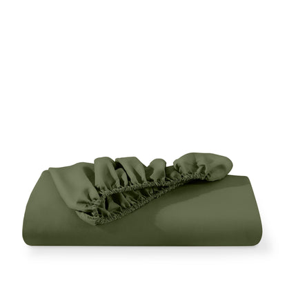 Microfiber fitted sheet folded with a white background