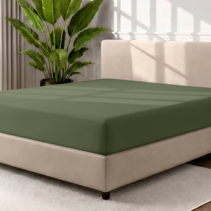 Ultra soft fitted sheet on a mattress with the sun shining into the bedroom