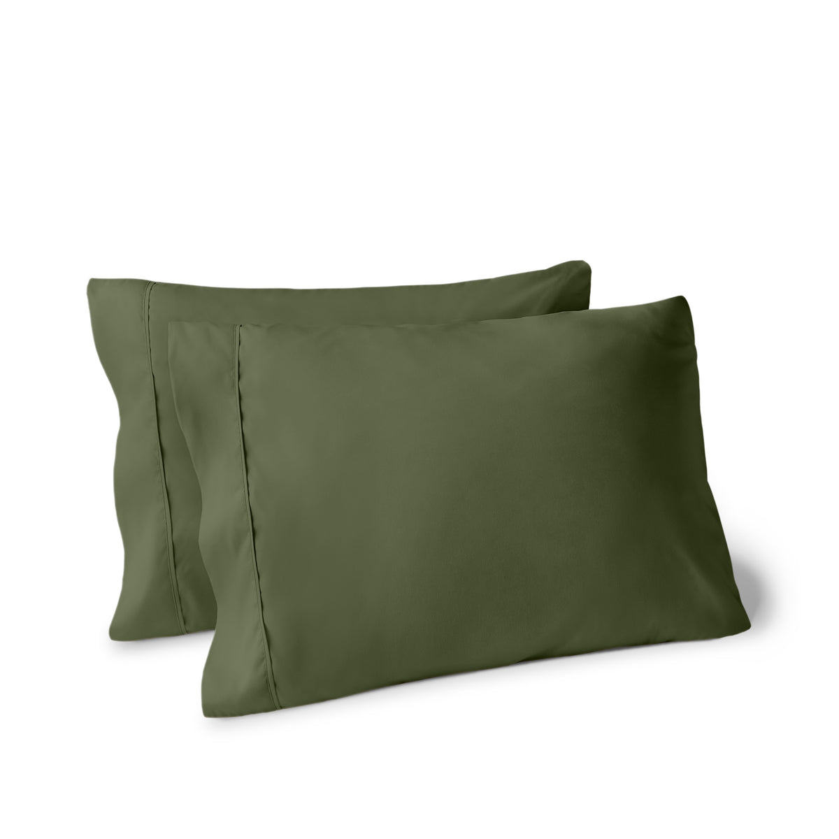 Two pillows on a white background with pillowcases on them