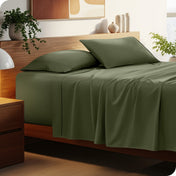 Bed with microfiber bedding and wooden headboard in a bedroom setting