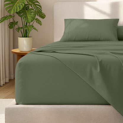 Bed with microfiber bedding and wooden headboard in a bedroom setting