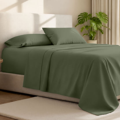 Microfiber bed sheets on a neatly made bed with a wooden headboard and nightstand.