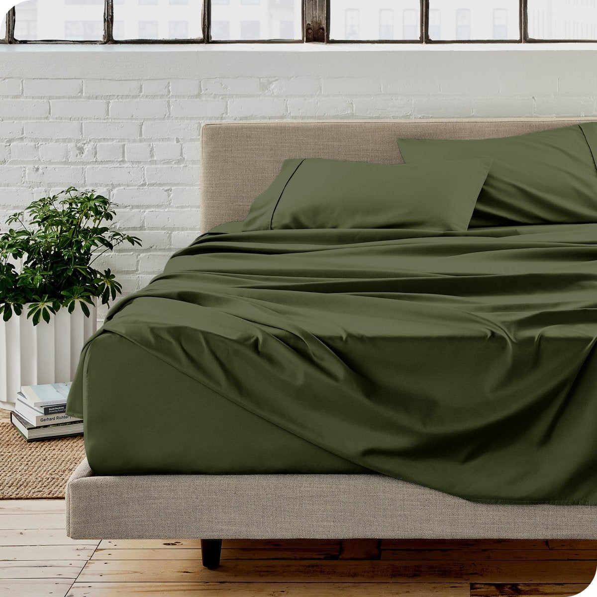 A modern bedroom with microfiber sheets on the mattress