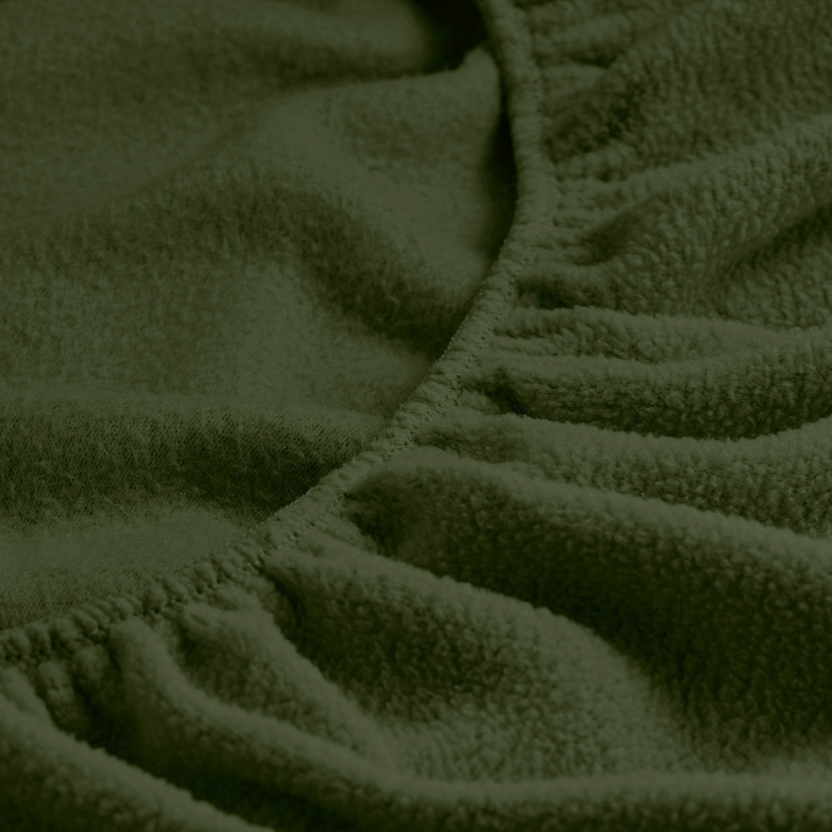Close-up of a fitted sheet with all around elastic