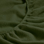 Close-up of a fitted sheet with all around elastic