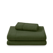 Polar fleece sheets and pillowcases folded and stacked on a white background