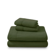 Polar fleece sheets and pillowcases folded and stacked on a white background