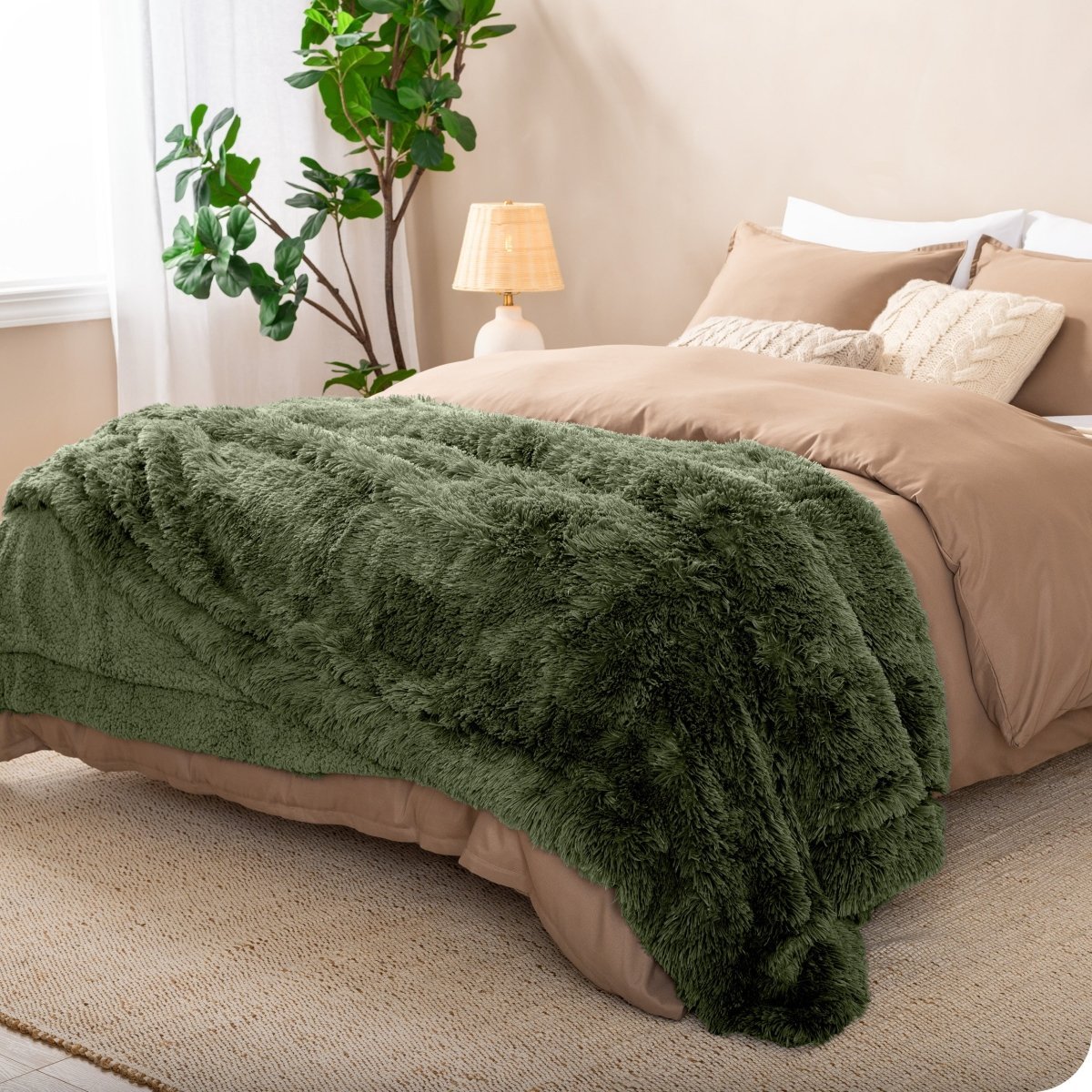 A shaggy faux fur blanket on the end of a bed