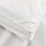 Close-up of the corner of a down comforter
