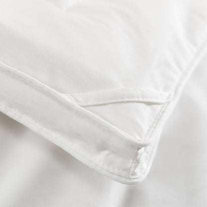 Close-up of the corner of a down comforter