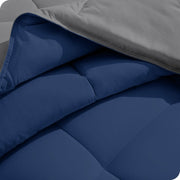 Close up of the comforter folded back showing the two different colored sides