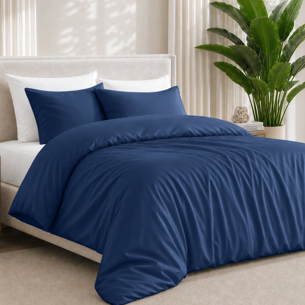 Bamboo bedding set on a bed in a bedroom with a plant in the corner.