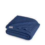 A cotton waffle blanket folded