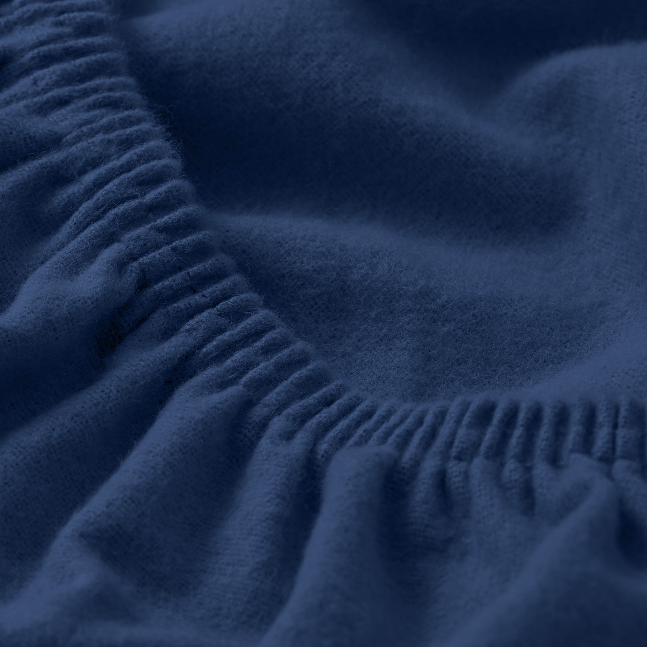 Close up of a flannel fitted sheet.