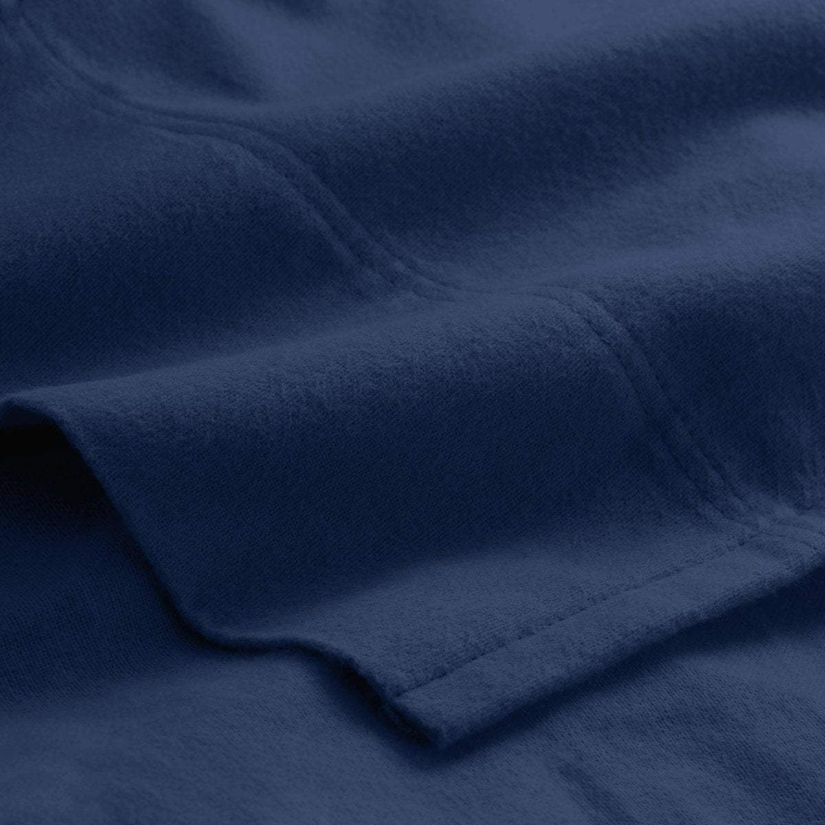 Close-up of flannel fabric with a focus on texture and color.