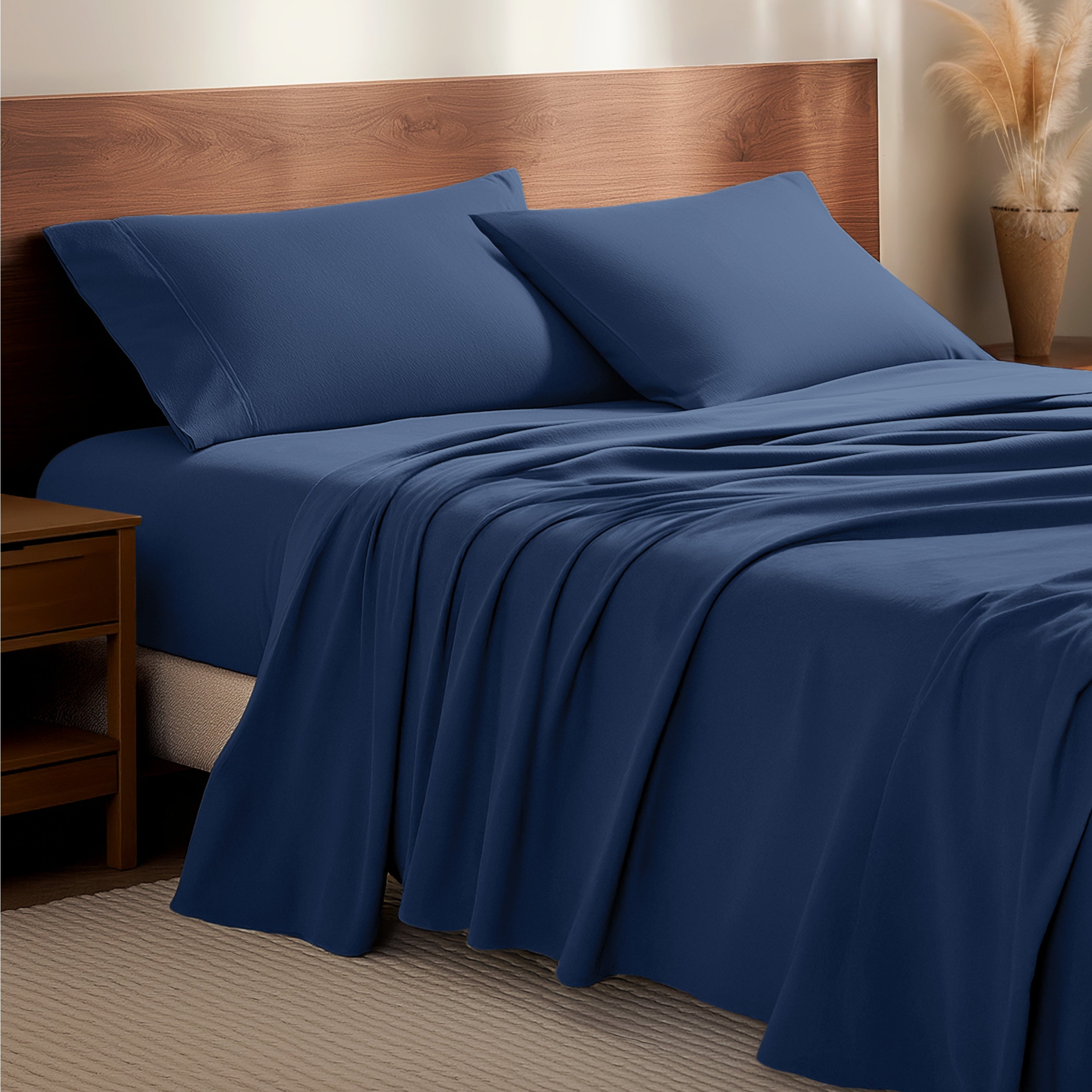 Flannel bedding set on a bed with a wooden headboard and side table