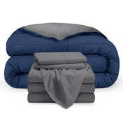 A reversible microfiber comforter and a coordinating sheet set folded and stacked