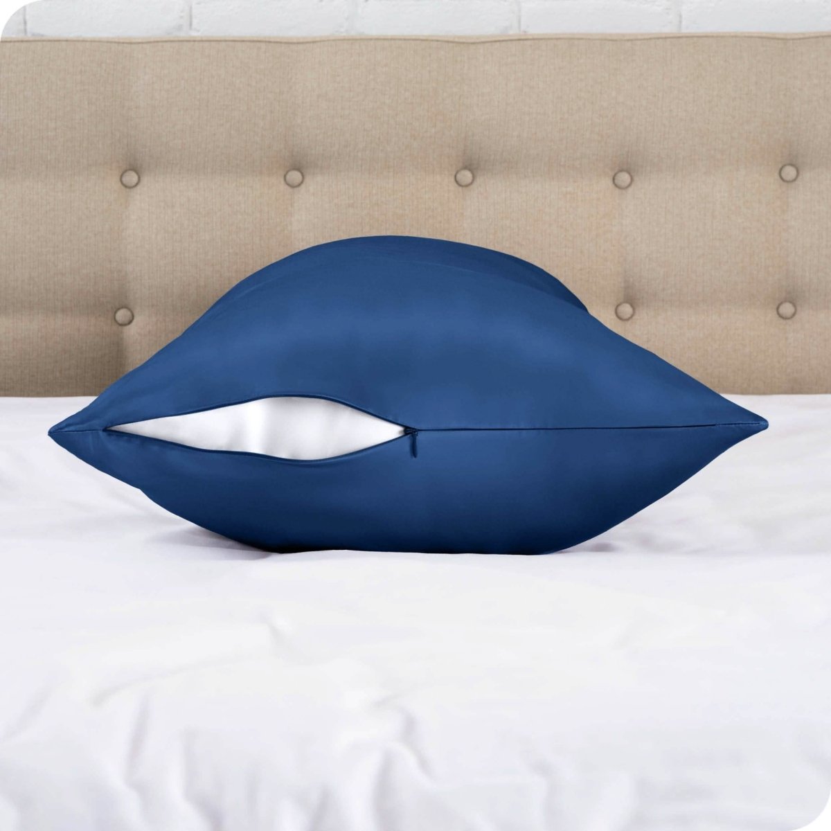 The zipper closure on a silk body pillowcase