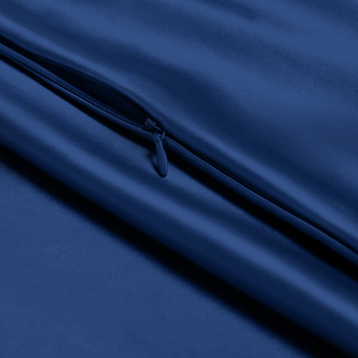 Close-up of a silk pillowcase with a zipper