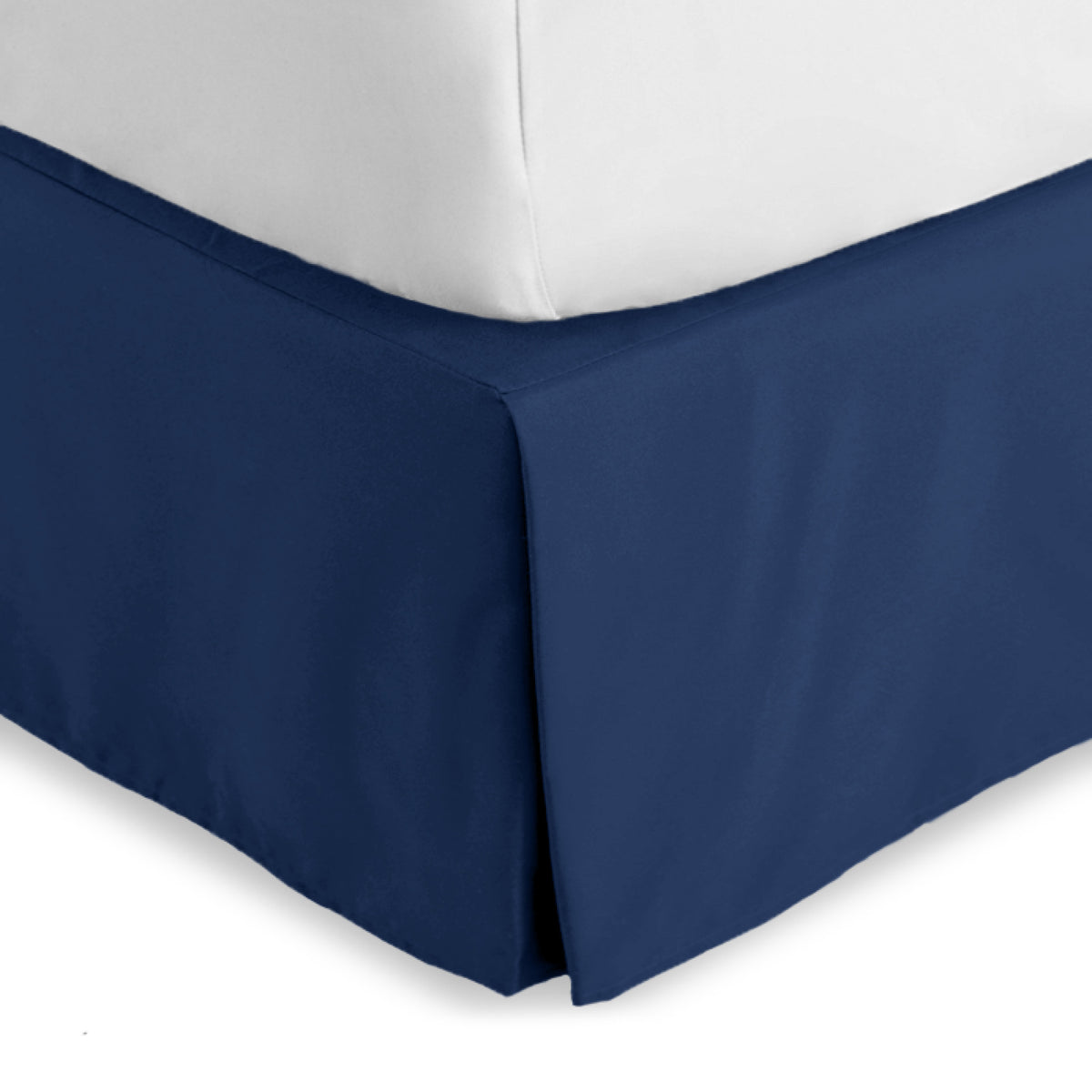 Bed skirt on a bed with white bedding