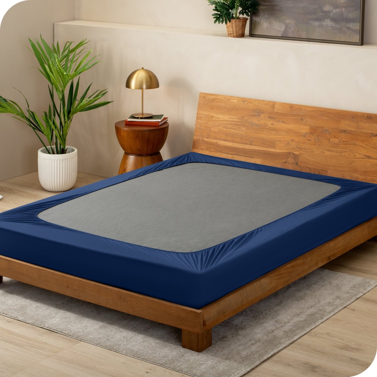 Blue box spring cover on a box spring