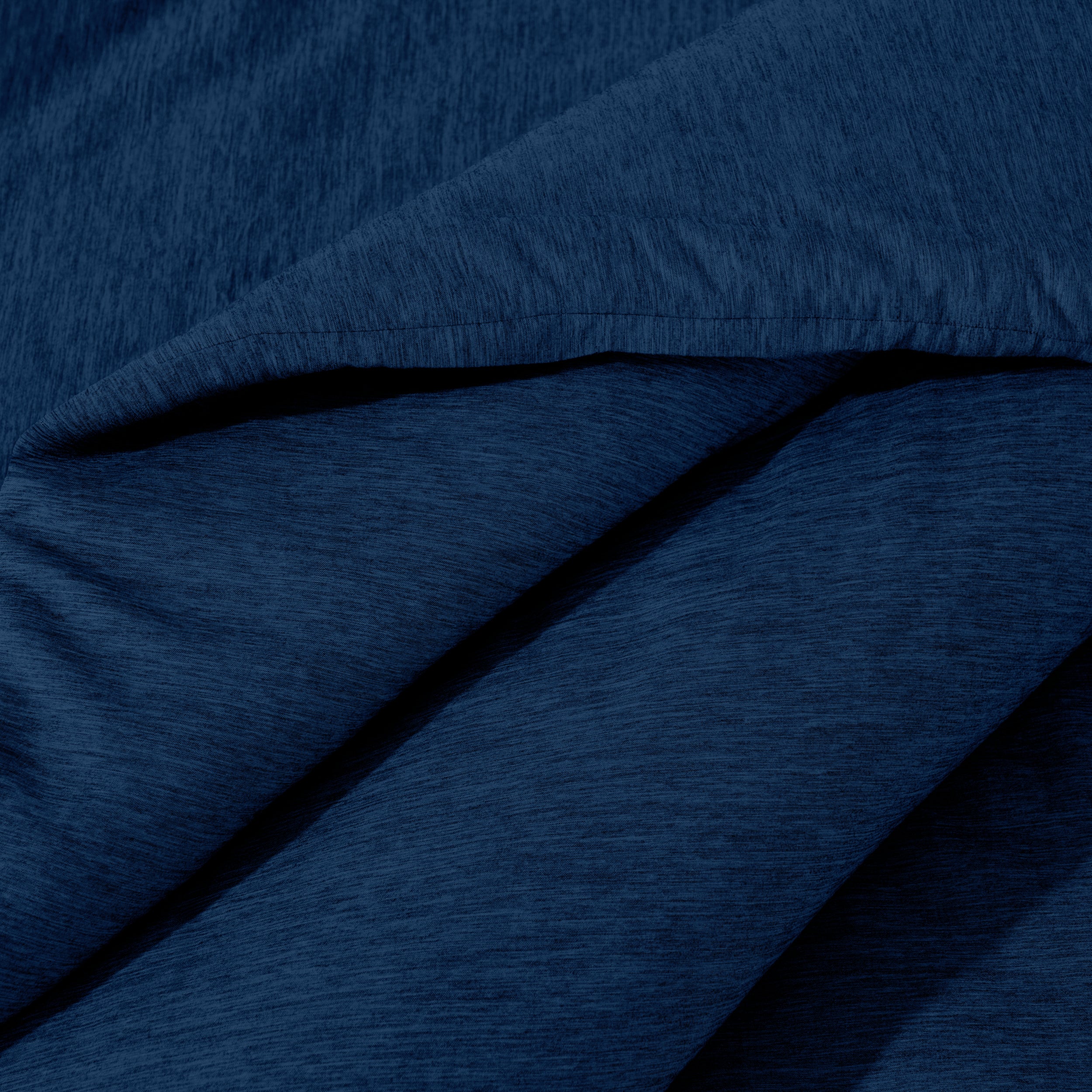Close-up of comforter on a bed