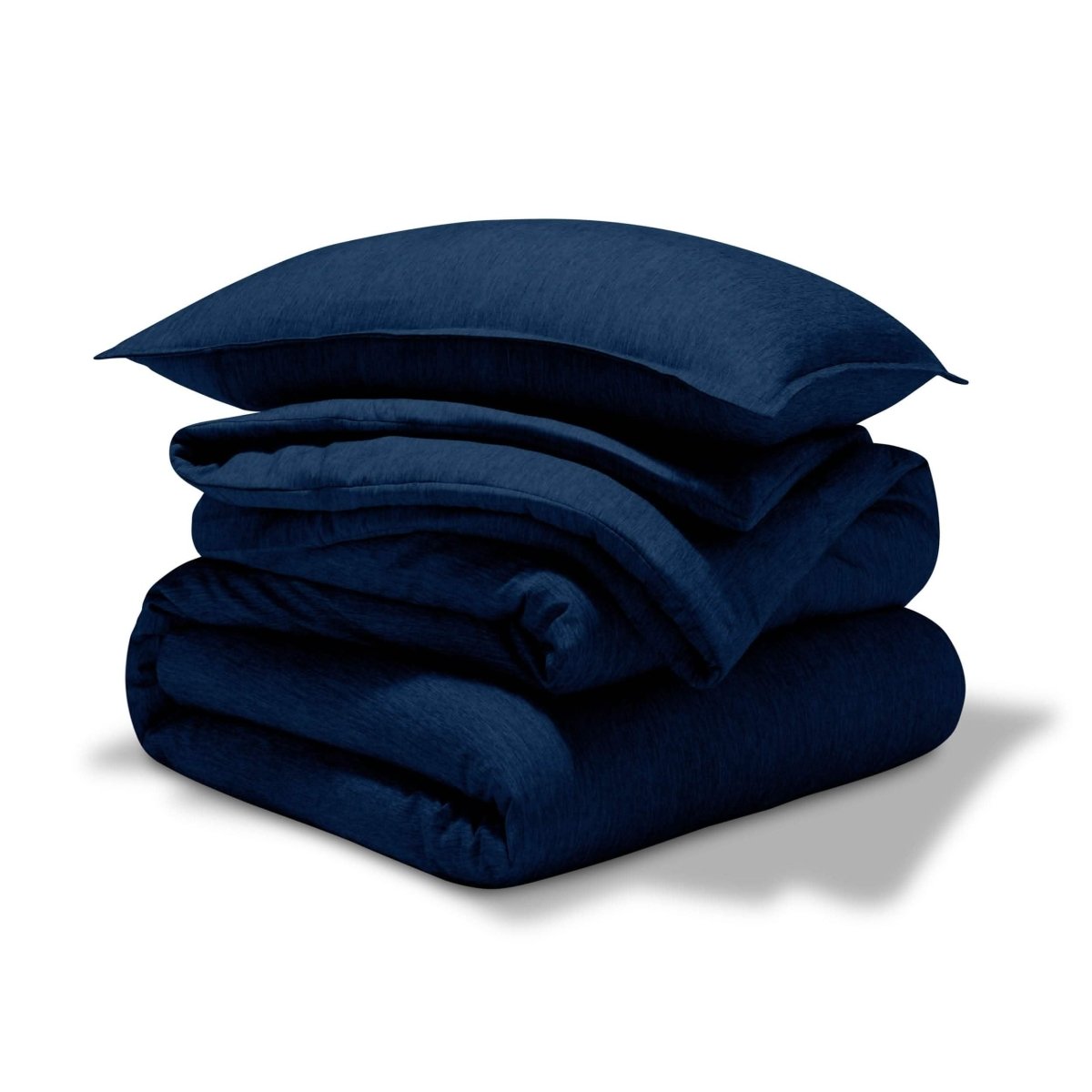 A comforter set folded and stacked