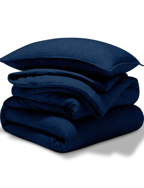 A comforter set folded and stacked