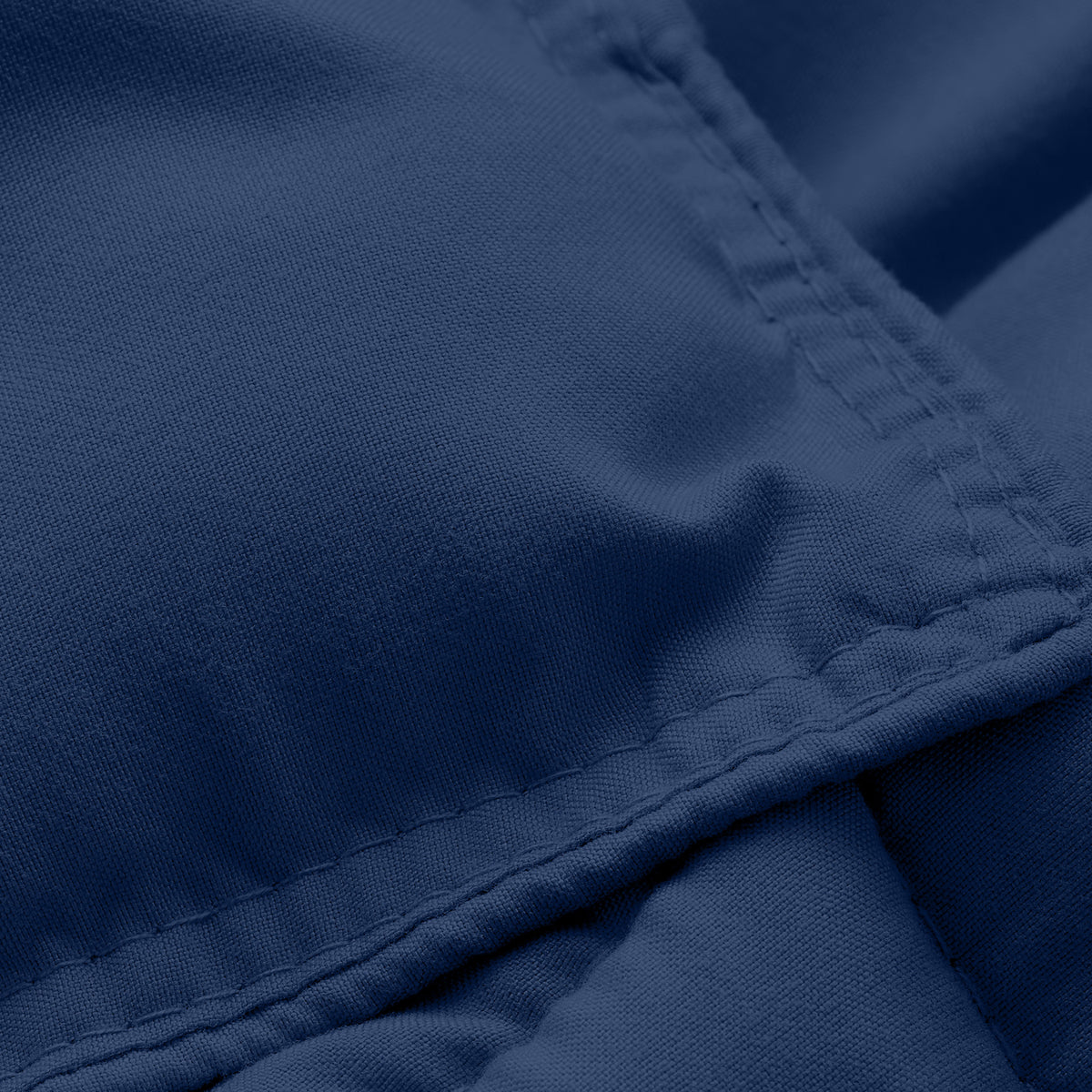 Close-up of comforter fabric with stitching detail
