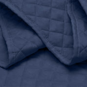 Close in view showing texture of coverlet set fabric